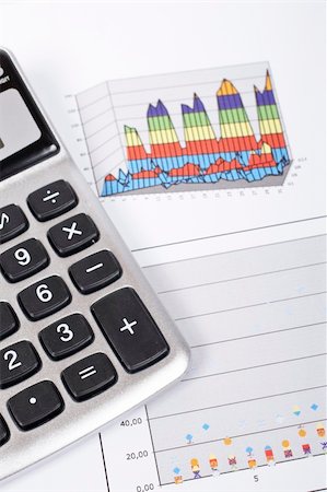 simsearch:400-03962284,k - Calculator and pencil on earnings chart background. Shallow depth of field Stock Photo - Budget Royalty-Free & Subscription, Code: 400-04035499