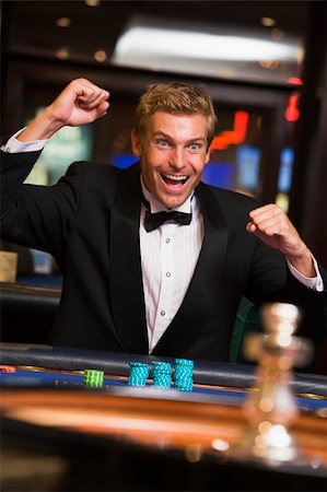 Man winniing at roulette table in casino Stock Photo - Budget Royalty-Free & Subscription, Code: 400-04035675