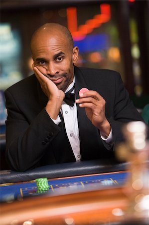 Man losing at roulette table in casino Stock Photo - Budget Royalty-Free & Subscription, Code: 400-04035686