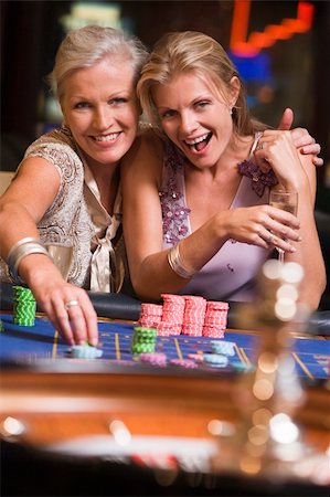 Two women gambling at roulette table in casino Stock Photo - Budget Royalty-Free & Subscription, Code: 400-04035732