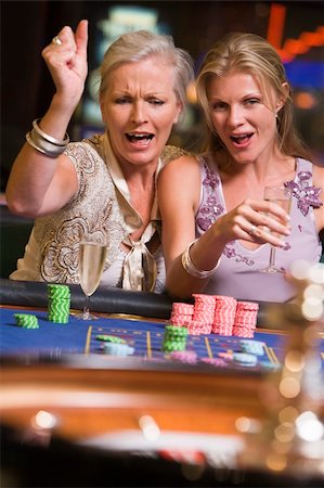 Two women gambling at roulette table in casino Stock Photo - Budget Royalty-Free & Subscription, Code: 400-04035733