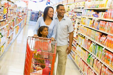 parents shopping trolley - Family shopping for groceries in supermarket Stock Photo - Budget Royalty-Free & Subscription, Code: 400-04035990