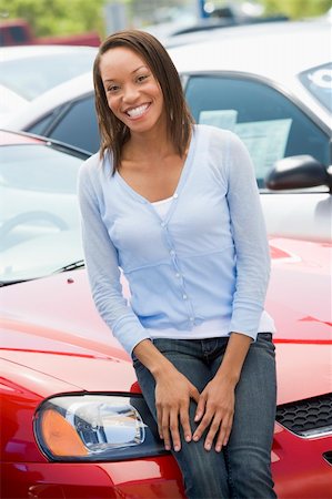 excited african american in a car - Woman choosing new car Stock Photo - Budget Royalty-Free & Subscription, Code: 400-04036017