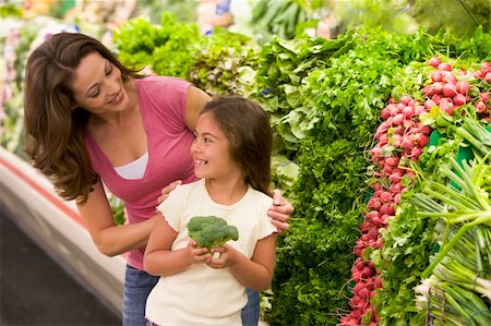 Mother and daughter choosing fresh produce in supermarket Stock Photo - Budget Royalty-Free & Subscription, Code: 400-04036043