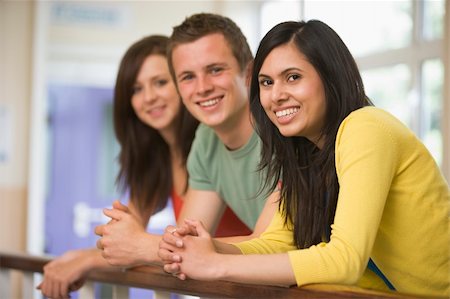 pakistani student - Three college students leaning on banister Stock Photo - Budget Royalty-Free & Subscription, Code: 400-04036222