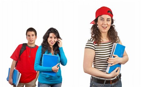 simsearch:400-04477480,k - Three students with books and backpacks over a white background. Focus at front Photographie de stock - Aubaine LD & Abonnement, Code: 400-04036250