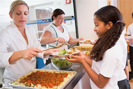 simsearch:400-04036581,k - Schoolgirl holding plate of lunch in school cafeteria Stock Photo - Budget Royalty-Free & Subscription, Code: 400-04036566