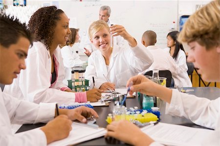 School children and their teacher in a high school science class Stock Photo - Budget Royalty-Free & Subscription, Code: 400-04036627