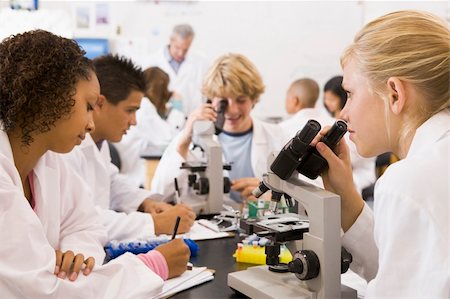 School children and their teacher in a high school science class Stock Photo - Budget Royalty-Free & Subscription, Code: 400-04036629