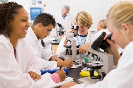 School children and their teacher in a high school science class Stock Photo - Budget Royalty-Free & Subscription, Code: 400-04036630