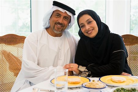 A Middle Eastern couple enjoying a meal Stock Photo - Budget Royalty-Free & Subscription, Code: 400-04036839