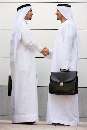 simsearch:400-04037075,k - Two Middle Eastern businessmen holding briefcases Stock Photo - Budget Royalty-Free & Subscription, Code: 400-04036985