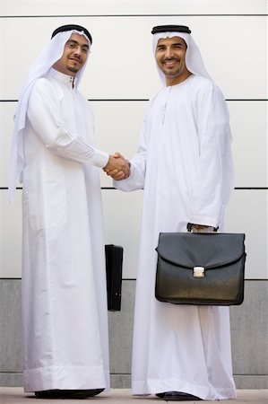 simsearch:400-04037075,k - Two Middle Eastern businessmen holding briefcases Stock Photo - Budget Royalty-Free & Subscription, Code: 400-04036987