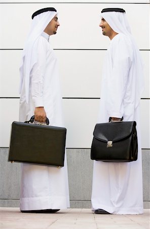 simsearch:400-04037075,k - Two Middle Eastern businessmen holding briefcases Stock Photo - Budget Royalty-Free & Subscription, Code: 400-04036983