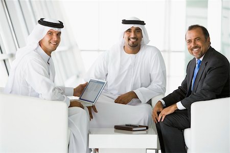 simsearch:400-04037075,k - Three Middle Eastern men talking at a business meeting Stock Photo - Budget Royalty-Free & Subscription, Code: 400-04037064