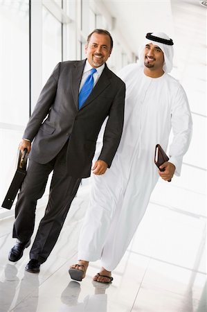 simsearch:400-04037075,k - Two Middle Eastern businessmen walking in a corridor Stock Photo - Budget Royalty-Free & Subscription, Code: 400-04037068