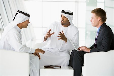 simsearch:400-04037075,k - A meeting between a Caucasian businessman and two Middle Eastern Stock Photo - Budget Royalty-Free & Subscription, Code: 400-04037096