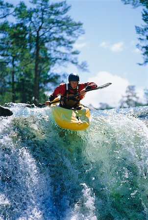 simsearch:400-04536316,k - Young man kayaking on waterfall Foto de stock - Super Valor sin royalties y Suscripción, Código: 400-04037286