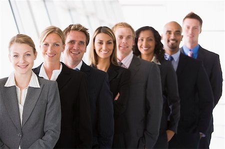 Line up of office staff facing camera Stock Photo - Budget Royalty-Free & Subscription, Code: 400-04037349