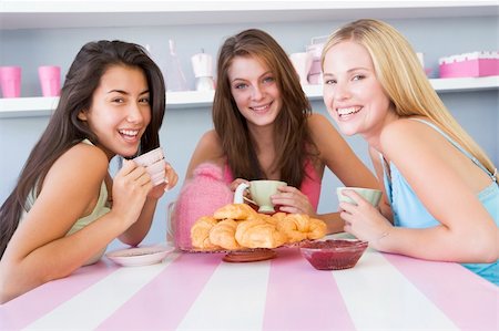 simsearch:400-05729065,k - Three young women in their underwear having a tea party Fotografie stock - Microstock e Abbonamento, Codice: 400-04037624