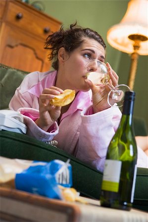 simsearch:400-05686620,k - A young woman in her pyjamas drinking wine Stock Photo - Budget Royalty-Free & Subscription, Code: 400-04037680
