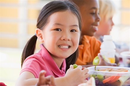 photos kids eating daycare - Kindergarten children eating lunch Stock Photo - Budget Royalty-Free & Subscription, Code: 400-04037879