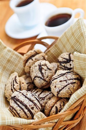 Fresh sandwich cookies in a basket and espresso coffee Stock Photo - Budget Royalty-Free & Subscription, Code: 400-04038112