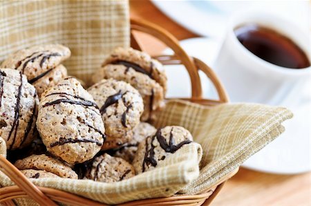 simsearch:400-05078153,k - Fresh sandwich cookies in a basket and espresso coffee Fotografie stock - Microstock e Abbonamento, Codice: 400-04038113