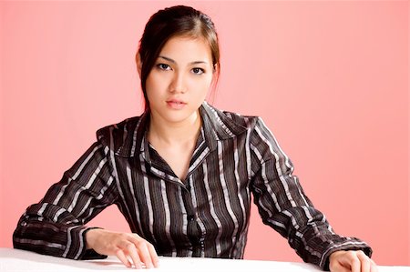 eyedear (artist) - young asian business woman concentrate on working Stock Photo - Budget Royalty-Free & Subscription, Code: 400-04038190