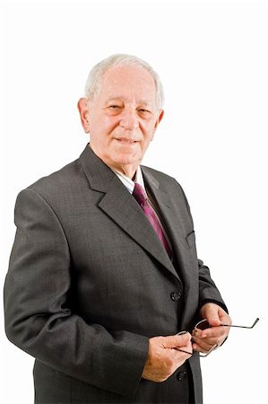 closeup  portrait off a senior businessman isolated on white Foto de stock - Super Valor sin royalties y Suscripción, Código: 400-04038478