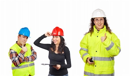 Three construction workers over a white background. Focus at front Stock Photo - Budget Royalty-Free & Subscription, Code: 400-04039029