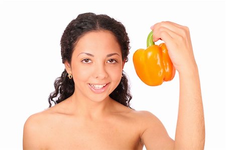 dead_morozzzka (artist) - A smiling, happy woman holds a yellow pepper in her hand, standing on white background. Photographie de stock - Aubaine LD & Abonnement, Code: 400-04030227