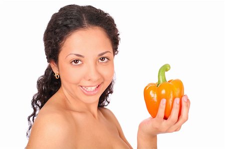 simsearch:693-06021794,k - A smiling, happy woman holds a yellow pepper in her hand, standing on white background. Stock Photo - Budget Royalty-Free & Subscription, Code: 400-04030228