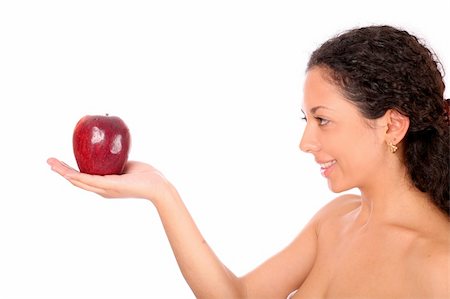 simsearch:693-06021794,k - A smiling woman holds a red apple in her hand, standing on white background Stock Photo - Budget Royalty-Free & Subscription, Code: 400-04030220