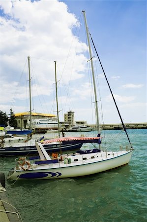 selhin (artist) - Yachts at the berth. Summer. Sunny Day. At the second yacht sailors are preparing for departure. Photographie de stock - Aubaine LD & Abonnement, Code: 400-04030299