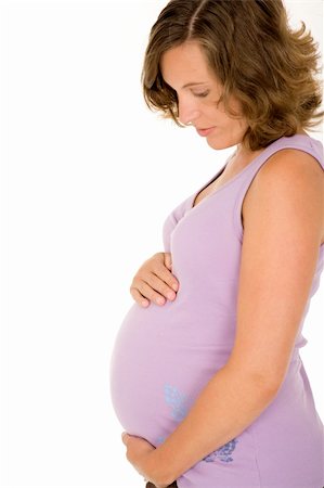simsearch:400-07546212,k - Caucasian woman who is 9 months pregnant on white background Stock Photo - Budget Royalty-Free & Subscription, Code: 400-04030518