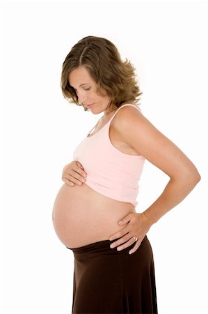 Caucasian woman who is 9 months pregnant on white background Stock Photo - Budget Royalty-Free & Subscription, Code: 400-04030520