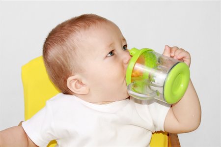 One-year-old baby is drincking water. Stock Photo - Budget Royalty-Free & Subscription, Code: 400-04030541