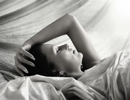 Black and white image of pretty woman sleeping peacefully Stock Photo - Budget Royalty-Free & Subscription, Code: 400-04030633