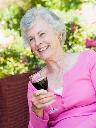 senior woman and wine and one person - Senior woman enjoying glass of red wine Stock Photo - Budget Royalty-Free & Subscription, Code: 400-04031450