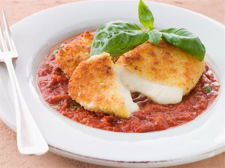 Plate of Fried Breaded Mozzarella Cheese with Tomato Ragu Stock Photo - Budget Royalty-Free & Subscription, Code: 400-04031491