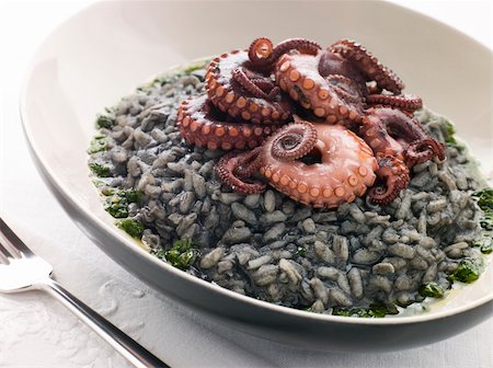 simsearch:400-04031652,k - Plate of Risotto Nero with Fried Octopus and Pesto Dressing Stock Photo - Budget Royalty-Free & Subscription, Code: 400-04031564