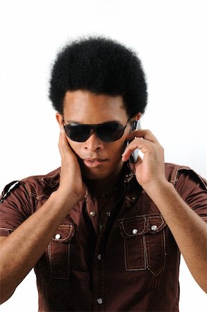 simsearch:400-05753456,k - Portrait of young trendy african male using a cell phose - isolated Foto de stock - Super Valor sin royalties y Suscripción, Código: 400-04032157