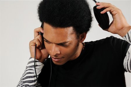 simsearch:400-04508759,k - Portrait of young trendy latino man with headphones Stock Photo - Budget Royalty-Free & Subscription, Code: 400-04032167