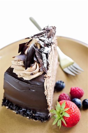 Slice of chocolate mousse cake served on a plate Stock Photo - Budget Royalty-Free & Subscription, Code: 400-04032203