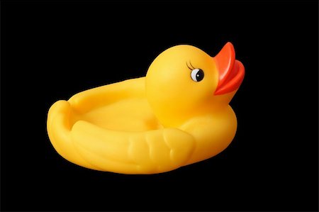 rubber duck isolated on black Stock Photo - Budget Royalty-Free & Subscription, Code: 400-04032396