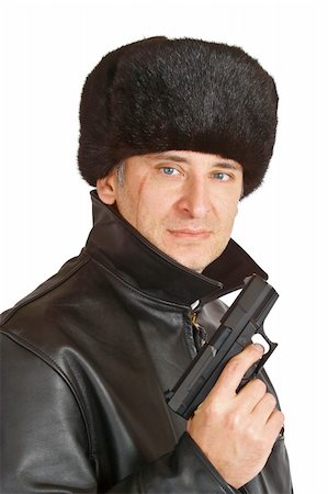 scars - A russian mafia figure with a large facial scar carrying a hand gun Stock Photo - Budget Royalty-Free & Subscription, Code: 400-04032660