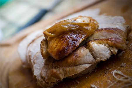 pig roast - juicy pork cooked on a table Stock Photo - Budget Royalty-Free & Subscription, Code: 400-04032729