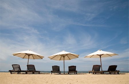 sanur - Beach chairs at Sanur beach, Bali Fotografie stock - Microstock e Abbonamento, Codice: 400-04032883