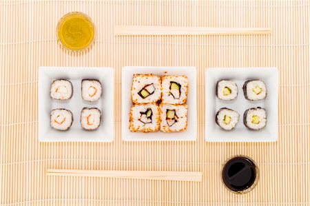 simsearch:400-06063702,k - three plates with different kinds of sushi Stock Photo - Budget Royalty-Free & Subscription, Code: 400-04032909